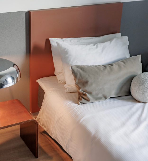 Solo Society guest room bed